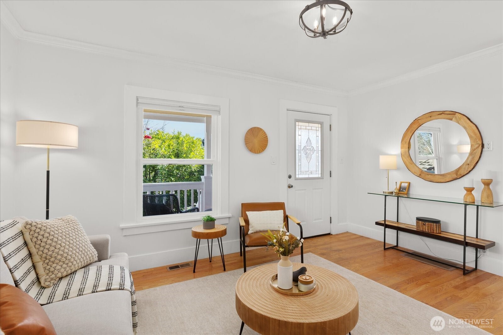 7729 18th Avenue Southwest Seattle, WA 98106 - Photo 15 of 36 a living room with furniture a window and a lamp