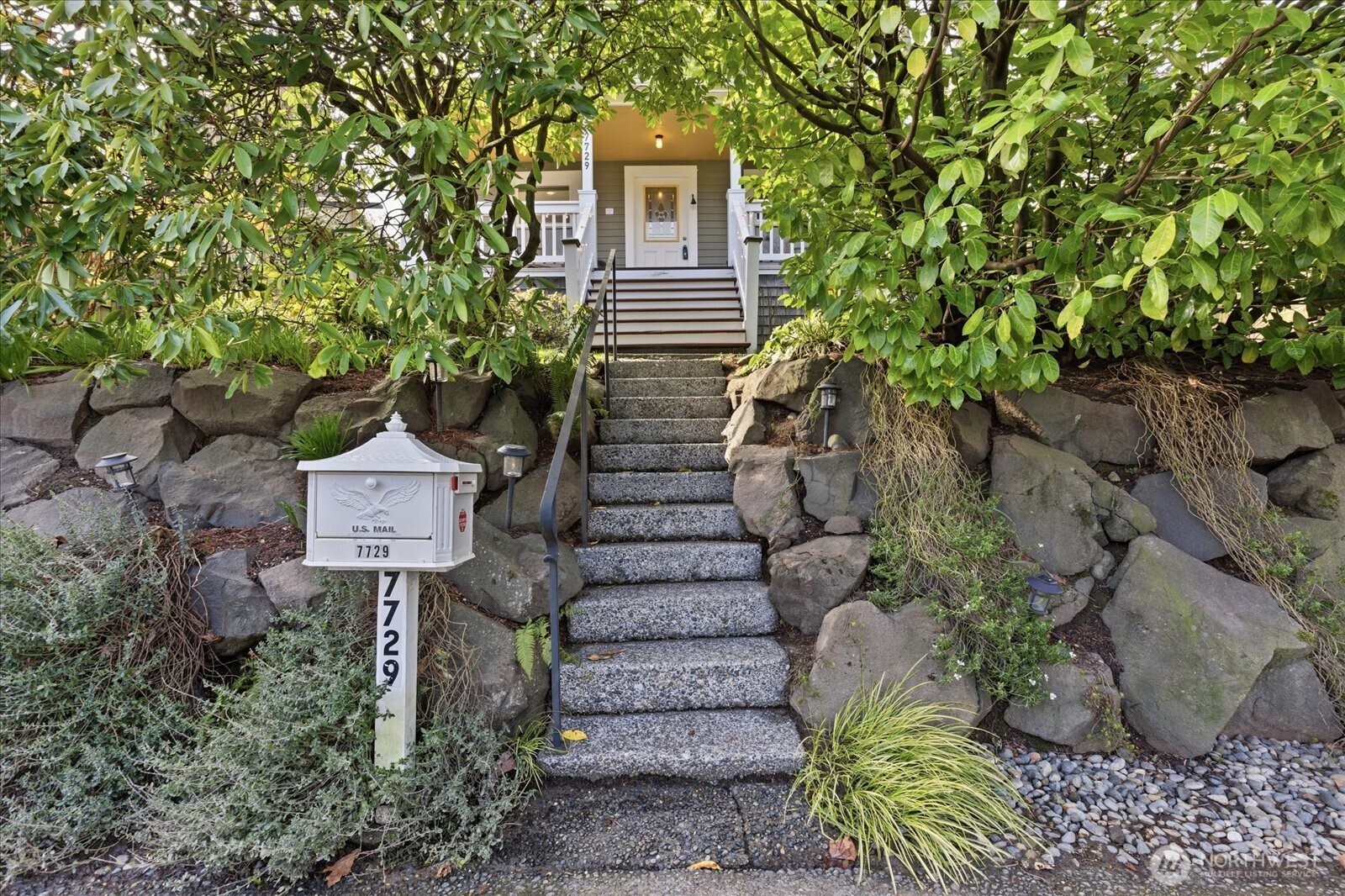 7729 18th Avenue Southwest Seattle, WA 98106 - Photo 2 of 36 a view of a entrance gate of the house