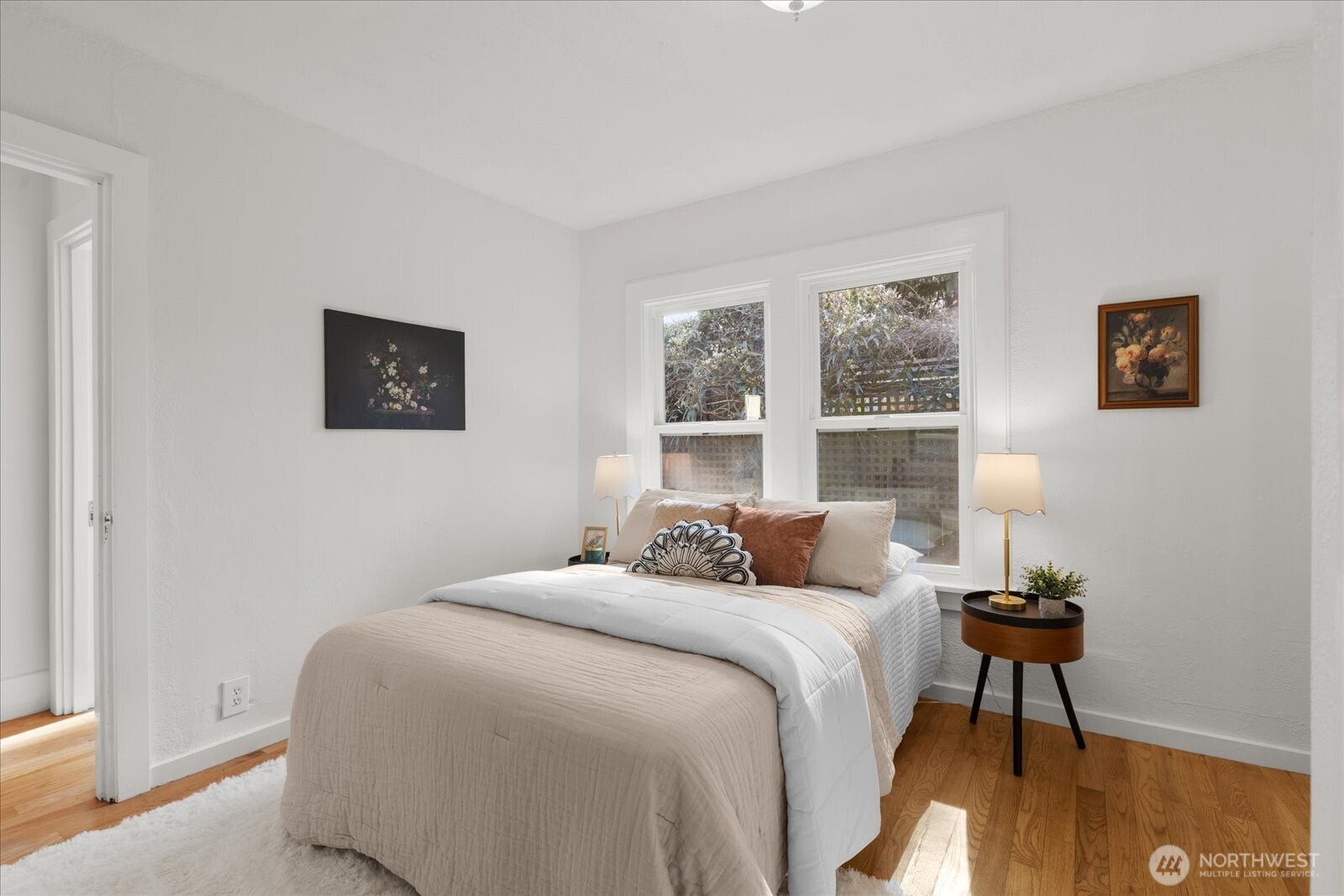 7729 18th Avenue Southwest Seattle, WA 98106 - Photo 23 of 36 a bedroom with a bed and a window