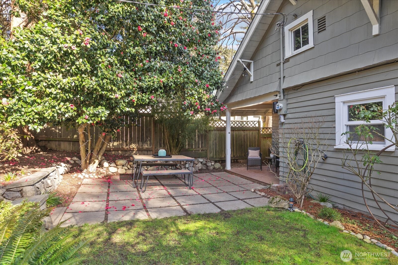 7729 18th Avenue Southwest Seattle, WA 98106 - Photo 30 of 36 a view of a backyard with sitting area