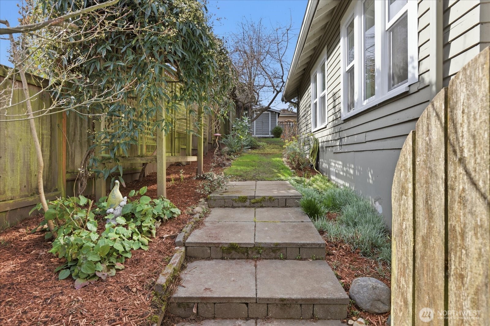 7729 18th Avenue Southwest Seattle, WA 98106 - Photo 31 of 36 a view of a pathway both side of the house