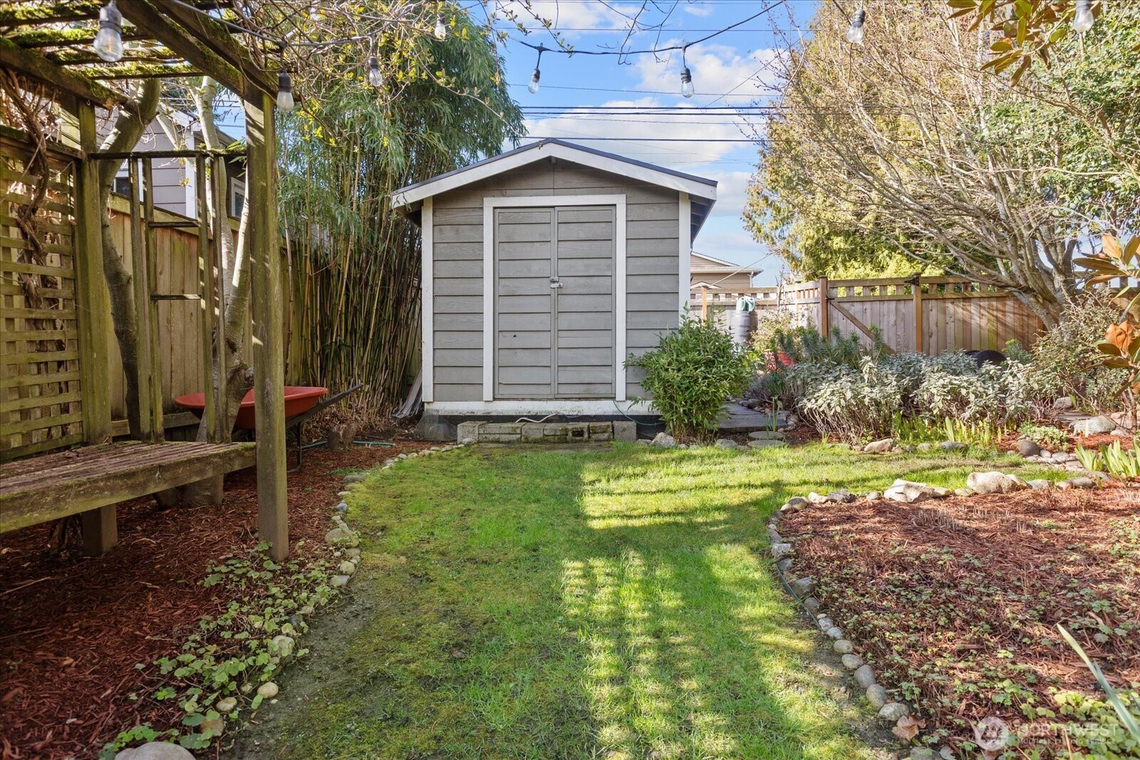 7729 18th Avenue Southwest Seattle, WA 98106 - Photo 33 of 36 a view of back yard of the house