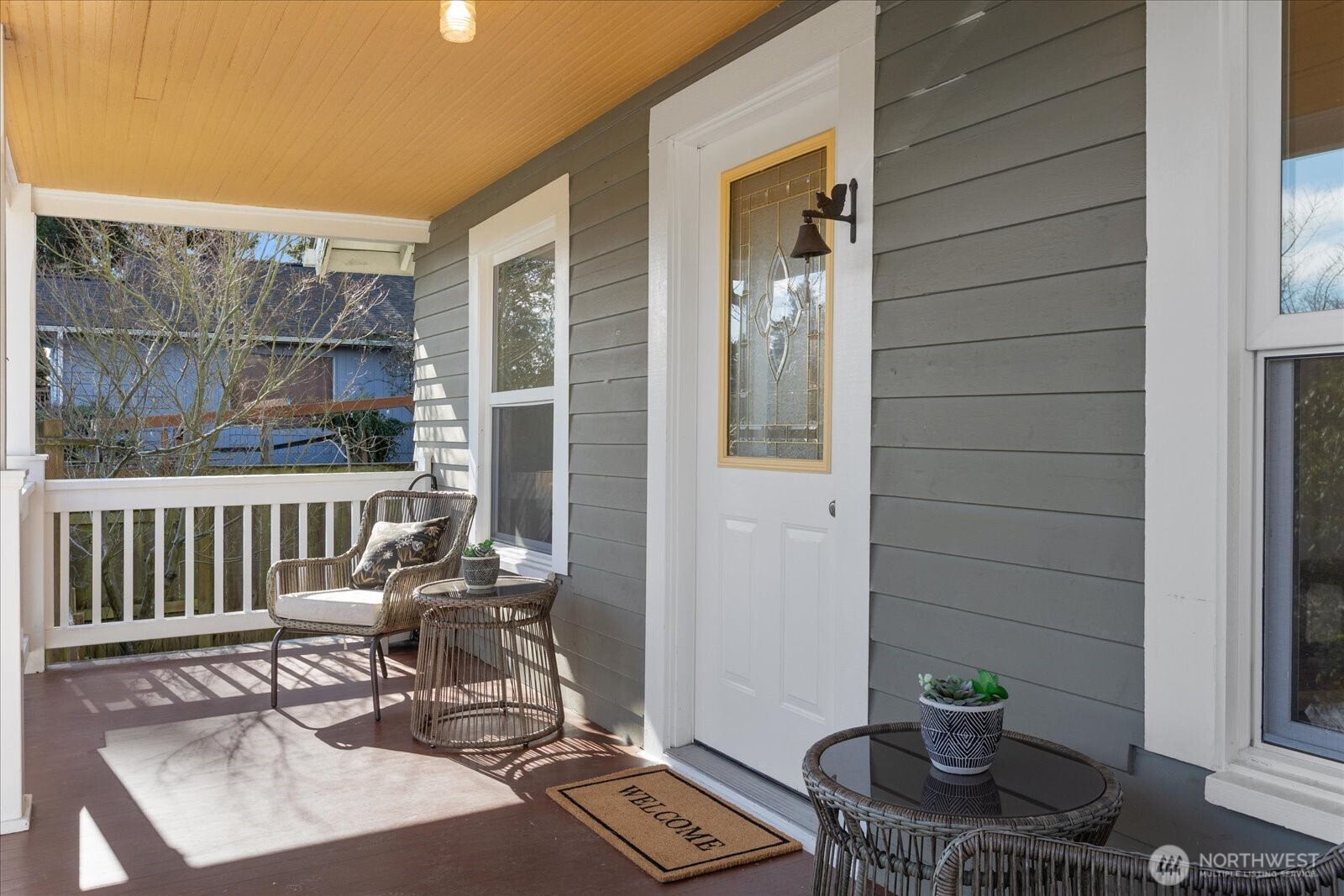7729 18th Avenue Southwest Seattle, WA 98106 - Photo 10 of 36 a view of a balcony with chair and potted plant