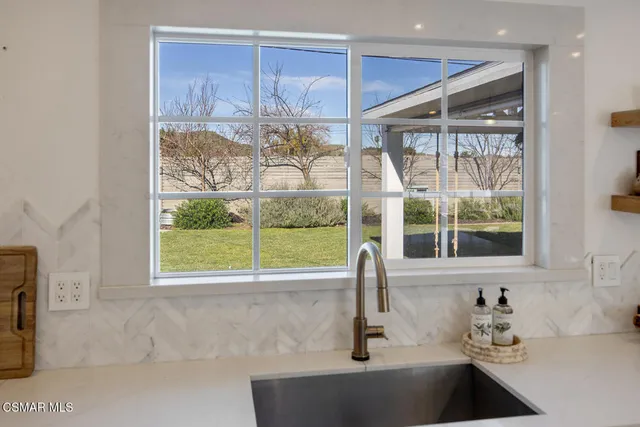 a view of a livingroom with furniture and a wooden floor