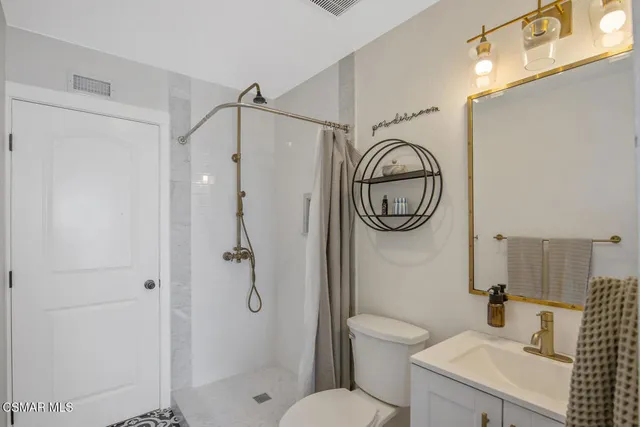 a view of a house with swimming pool and a yard