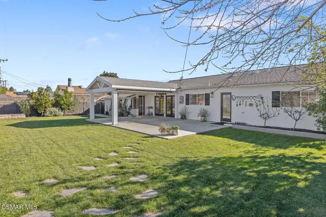 a front view of a house with patio