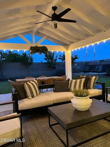 an aerial view of residential houses with outdoor space and river