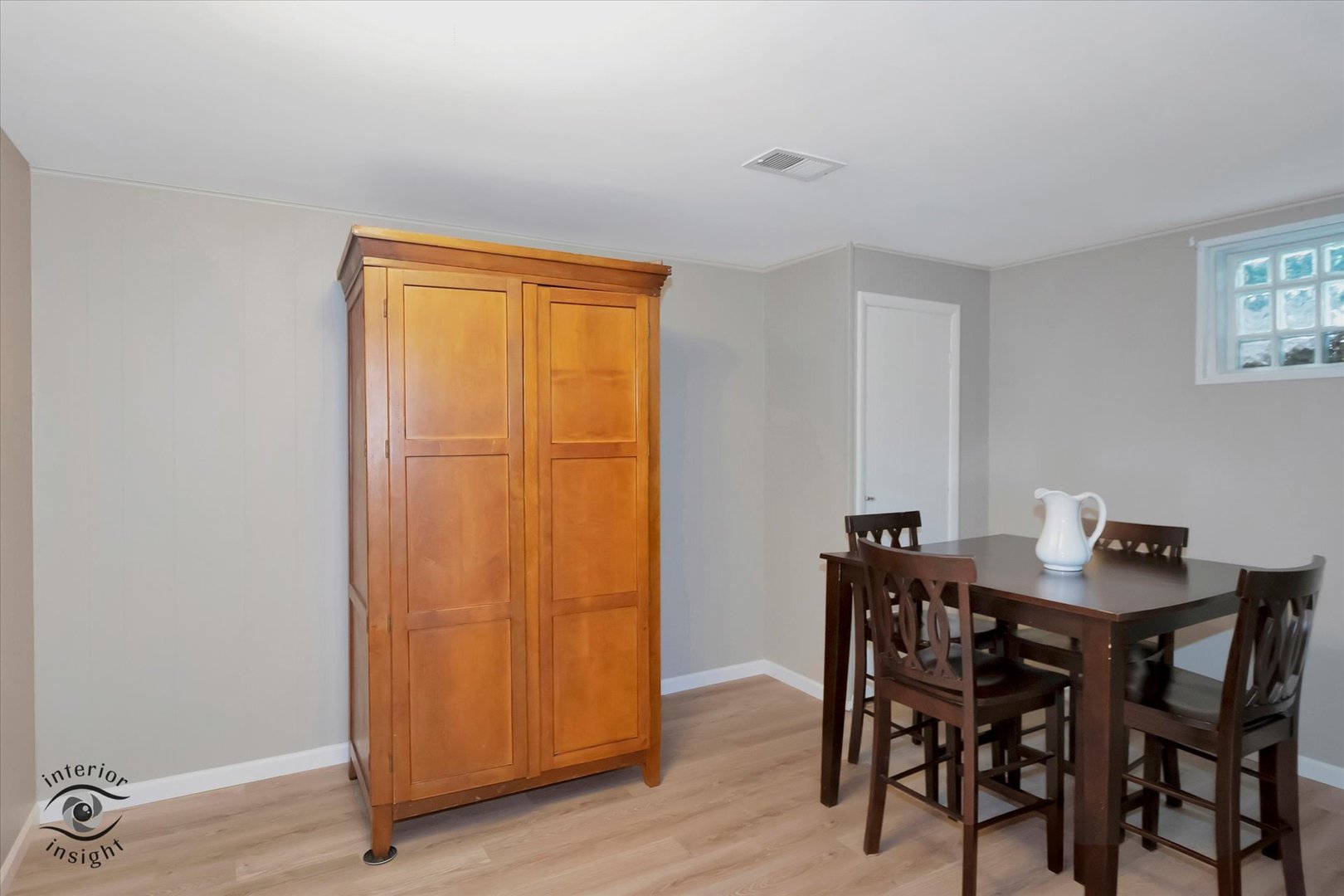 27W213 Manchester Road Winfield, IL 60190 - Photo 23 of 28 a view of a dining room with furniture and wooden floor