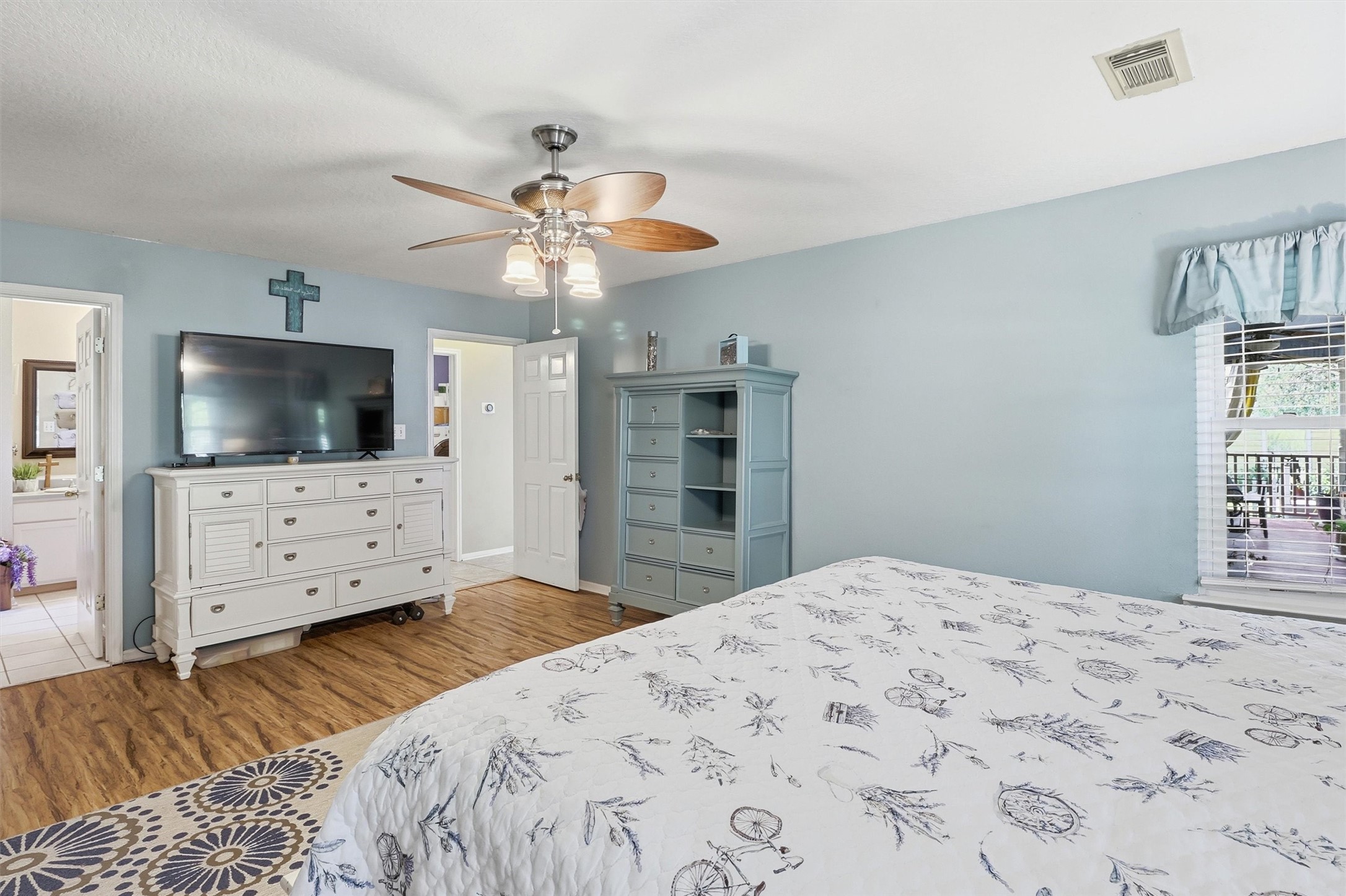 2325 Skrivanek Road Sealy, TX 77474 - Photo 15 of 36 a bedroom with a bed and a flat screen tv
