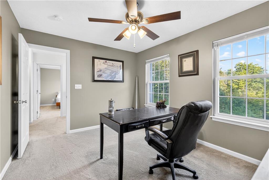 139 Ladybug Lane Ligonier, PA 15658 - Photo 23 of 33 a view of a workspace with furniture and a window