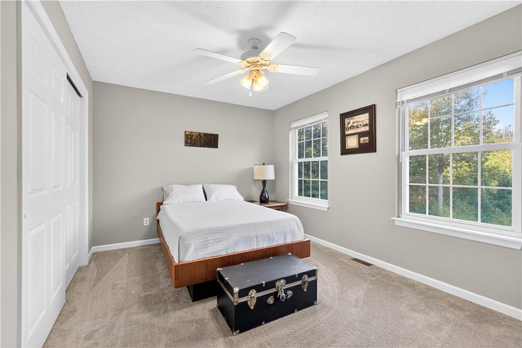 139 Ladybug Lane Ligonier, PA 15658 - Photo 25 of 33 a bedroom with a bed and a window