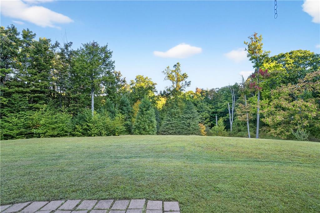 139 Ladybug Lane Ligonier, PA 15658 - Photo 31 of 33 a view of a grassy field with trees