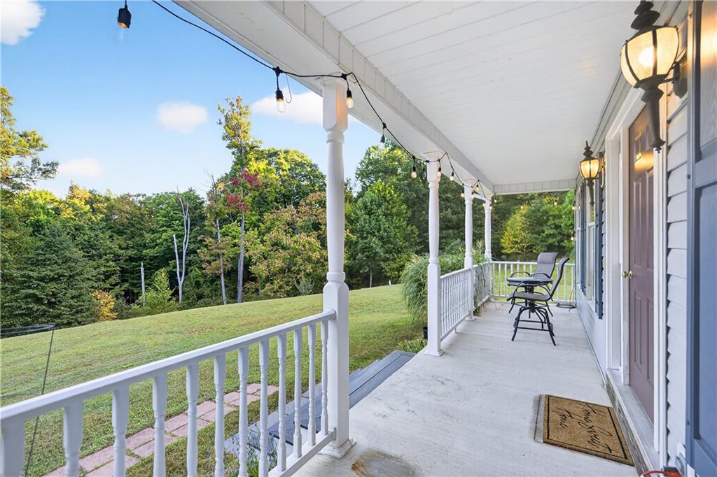 139 Ladybug Lane Ligonier, PA 15658 - Photo 4 of 33 a view of a chair and tables in the balcony