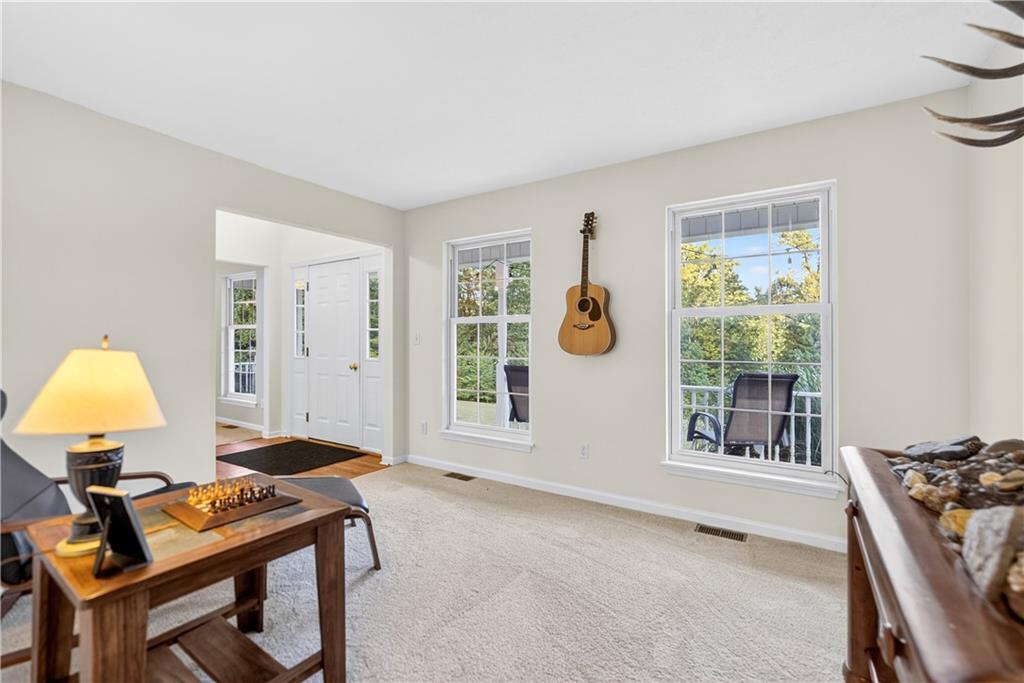 139 Ladybug Lane Ligonier, PA 15658 - Photo 6 of 33 a workspace with a couch and a window