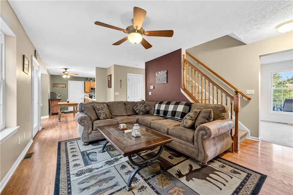 139 Ladybug Lane Ligonier, PA 15658 - Photo 9 of 33 a living room with furniture and a wooden floor