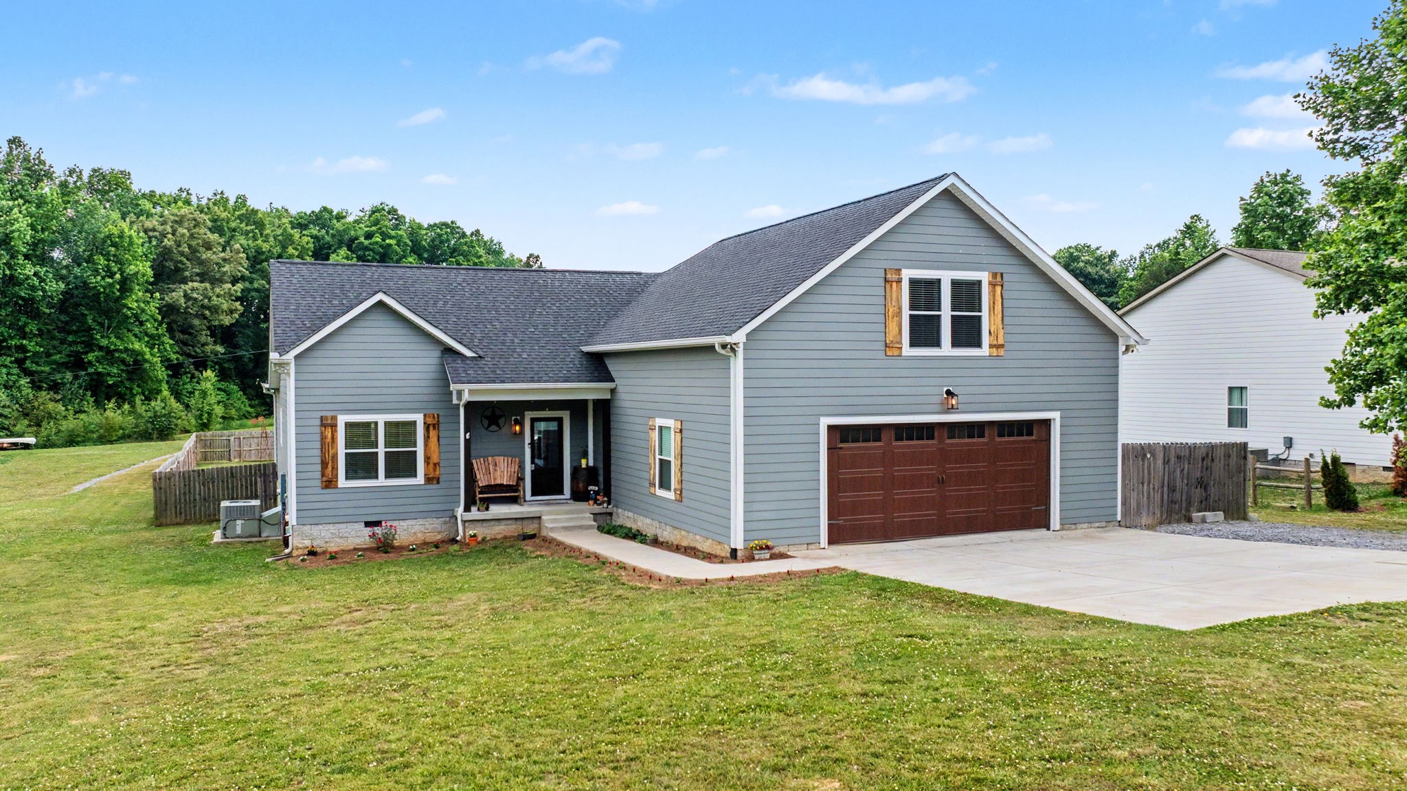 601 King Ridge Road Dowelltown, TN 37059 - Photo 6 of 49 a view of a house with a yard and sitting area