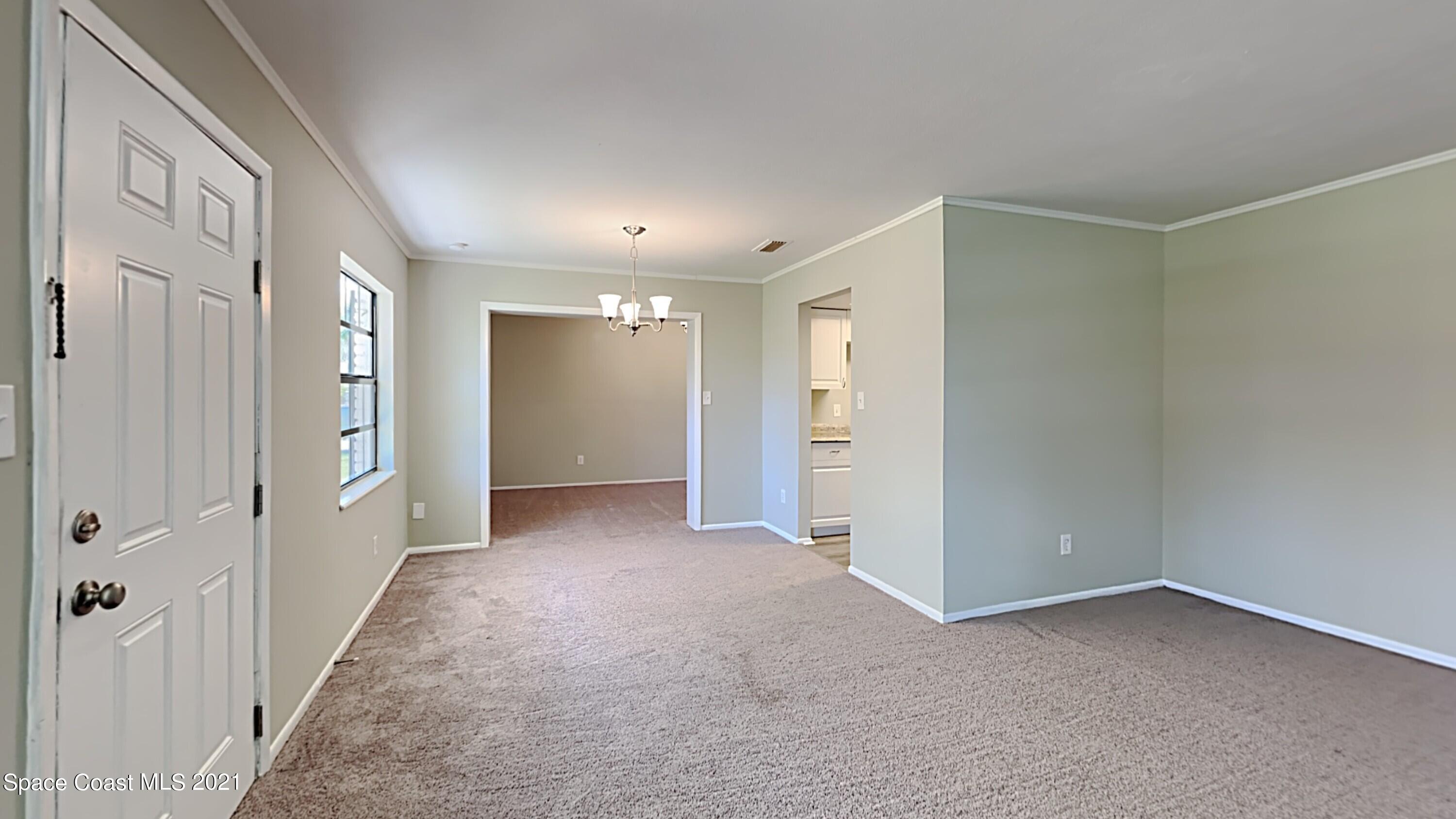 955 Lexington Road Rockledge, FL 32955 - Photo 2 of 18 a view of a hallway