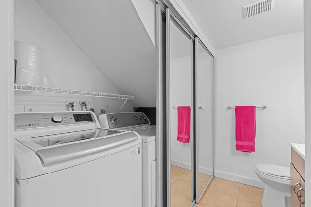 a view of a backyard with pathway