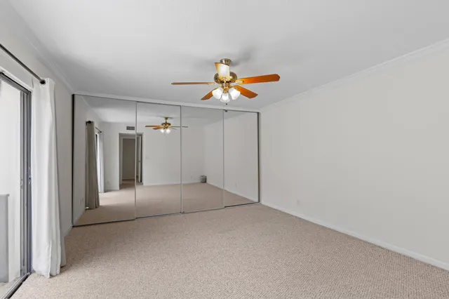 a bathroom with a sink mirror toilet and bathtub