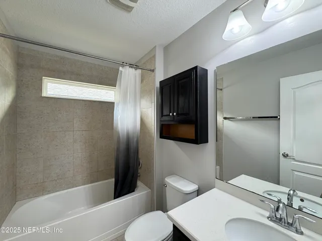 a bathroom with a toilet