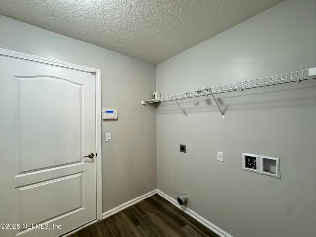 a bathroom with a sink a toilet a mirror and vanity