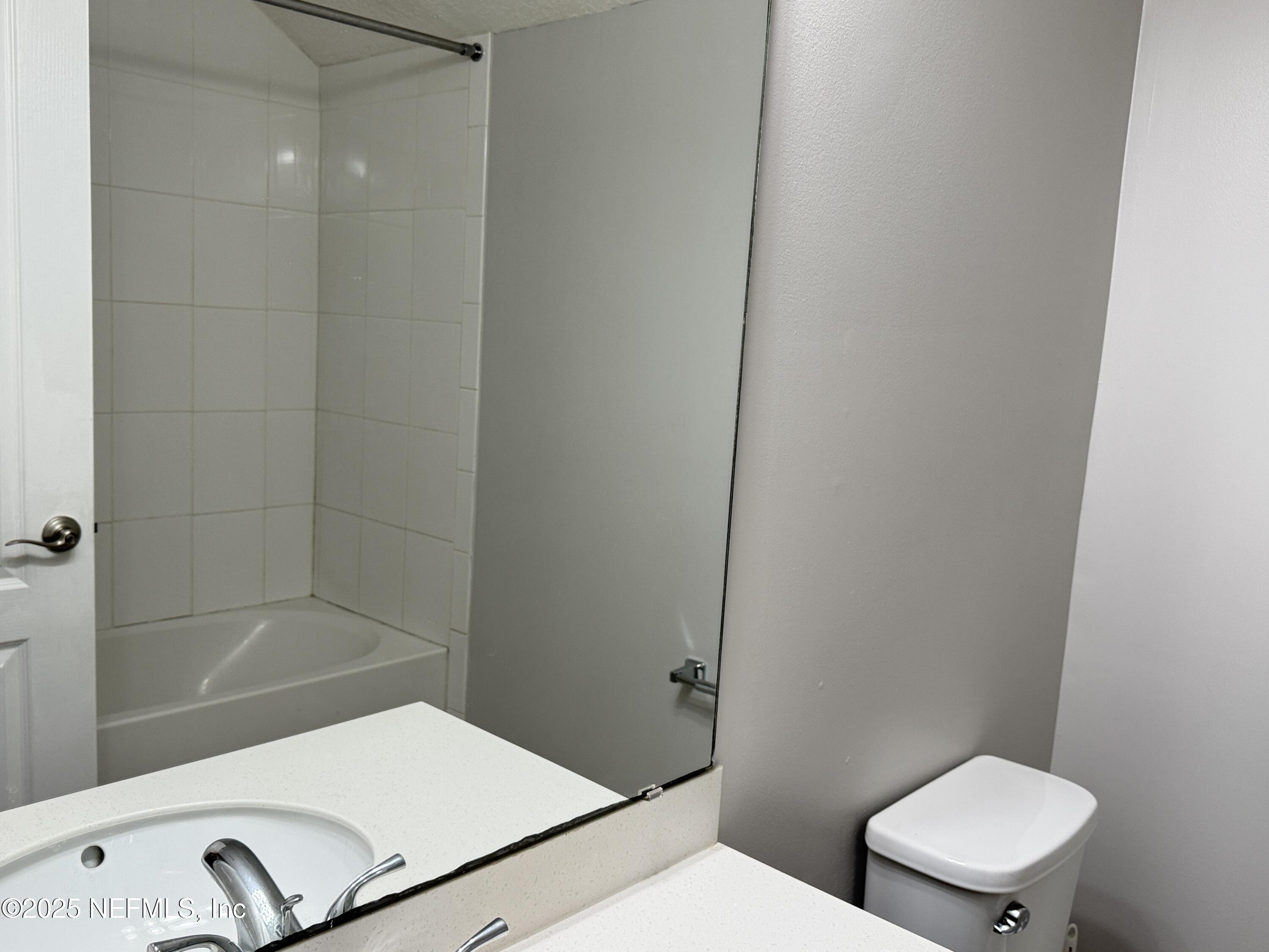 94267 Woodbrier Circle Fernandina Beach, FL 32034 - Photo 25 of 32 a bathroom with a toilet