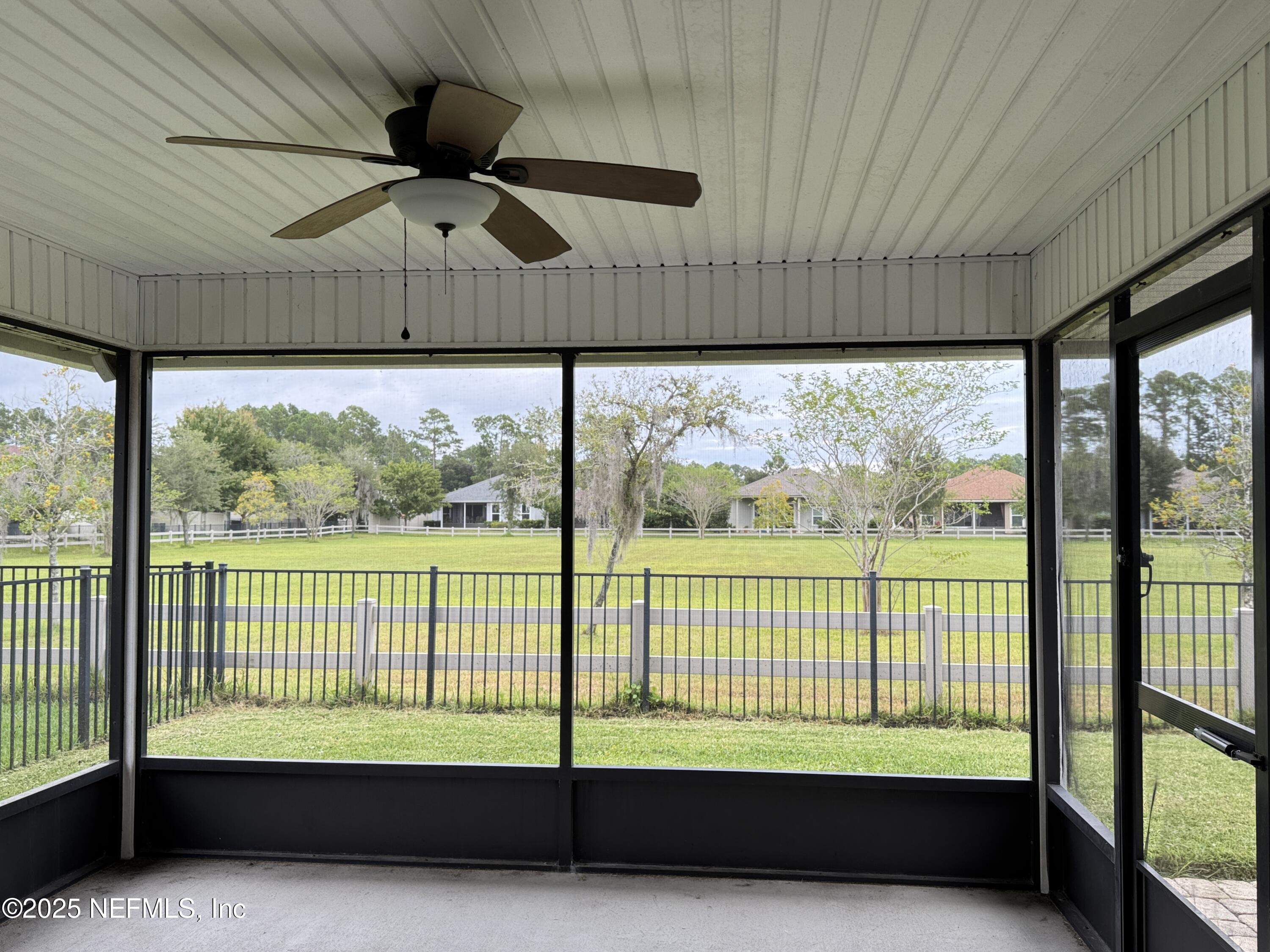 94267 Woodbrier Circle Fernandina Beach, FL 32034 - Photo 27 of 32 a view of a room with a large window