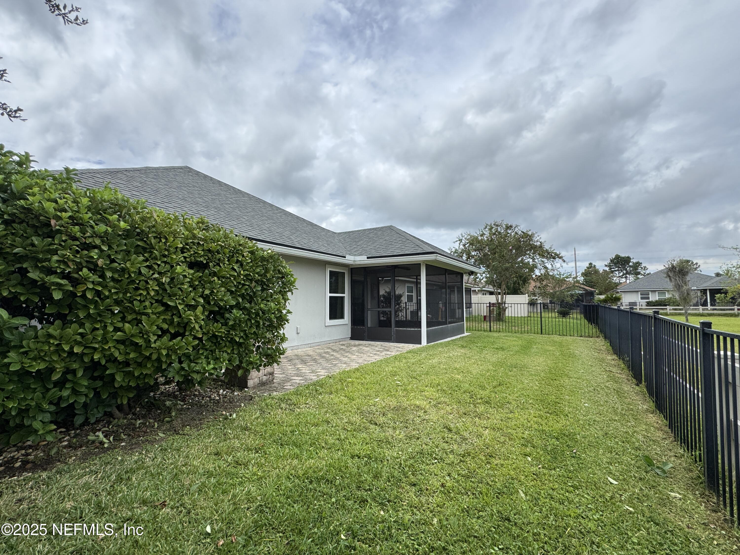 94267 Woodbrier Circle Fernandina Beach, FL 32034 - Photo 29 of 32 Fenced Backyard