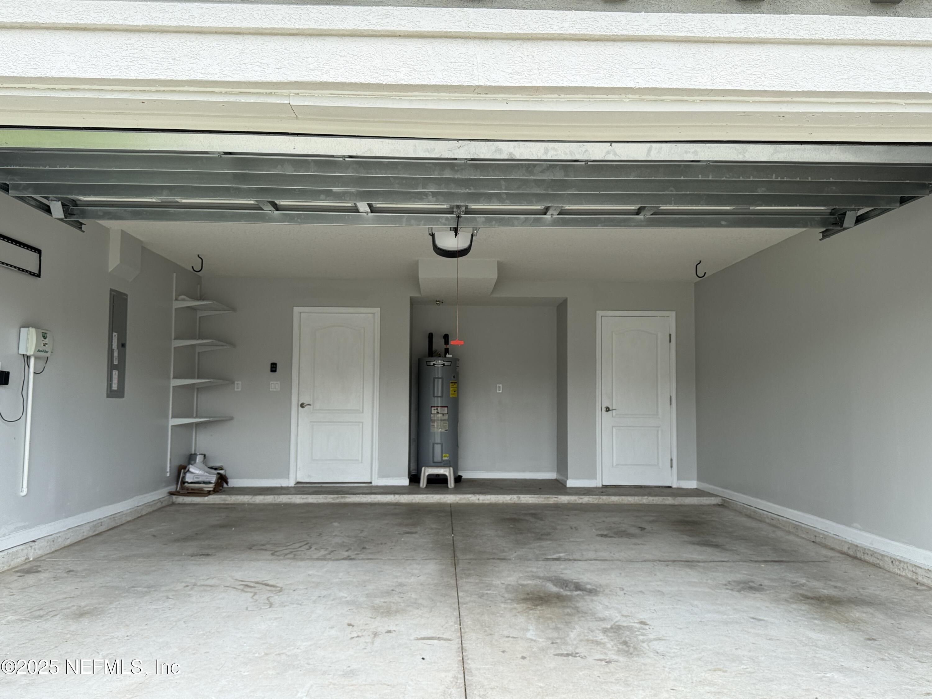 94267 Woodbrier Circle Fernandina Beach, FL 32034 - Photo 32 of 32 a view of a utility room with a cabinet