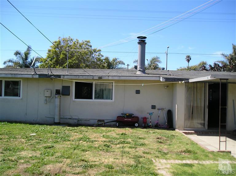 4900 Saviers Road Oxnard, CA 93033 - Photo 13 of 14 a view of a house with a backyard