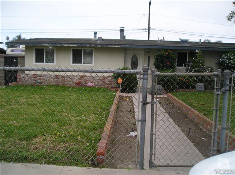 4900 Saviers Road Oxnard, CA 93033 - Photo 3 of 14 a front view of a house with garden