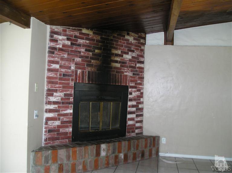 4900 Saviers Road Oxnard, CA 93033 - Photo 7 of 14 a room with fireplace