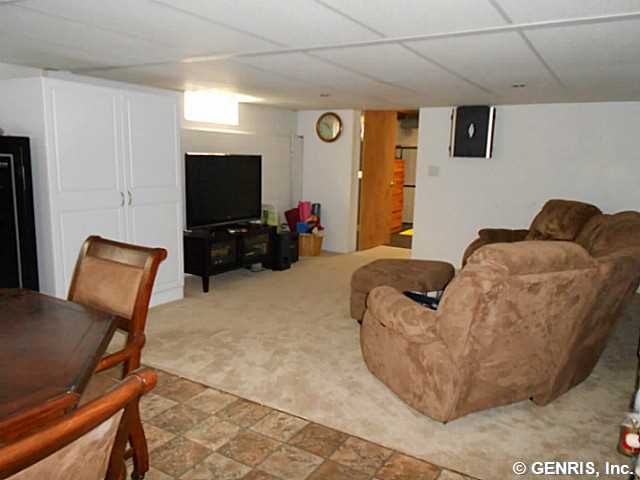 560 Helendale Road Irondequoit, NY 14609 - Photo 12 of 19 Rec room. The recreation room has several windows