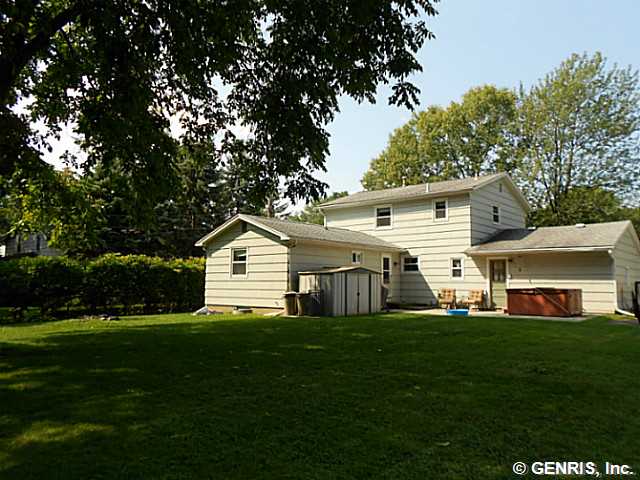 560 Helendale Road Irondequoit, NY 14609 - Photo 19 of 19 Backyard. The fenced yard is perfect for busy chil