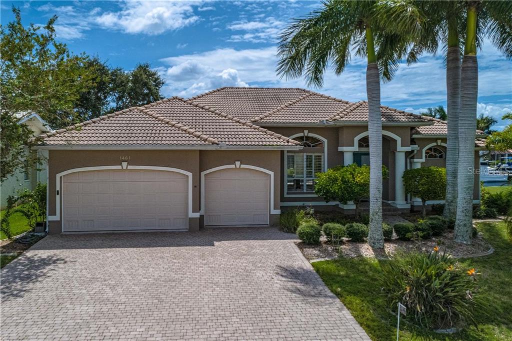 PUNTA GORDA ISLES! LUXURY 3/2.5/3 WATERFRONT POOL HOME WITH SAILBOAT ACCESS TO CHARLOTTE HARBOR LEADING TO THE GULF OF MEXICO!