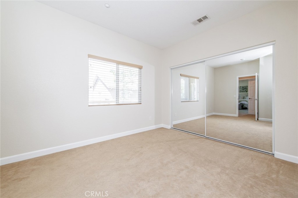4947 Plumtree Court Riverside, CA 92504 - Photo 32 of 46 Spacious 3rd bedroom with mirrored closet & storage space