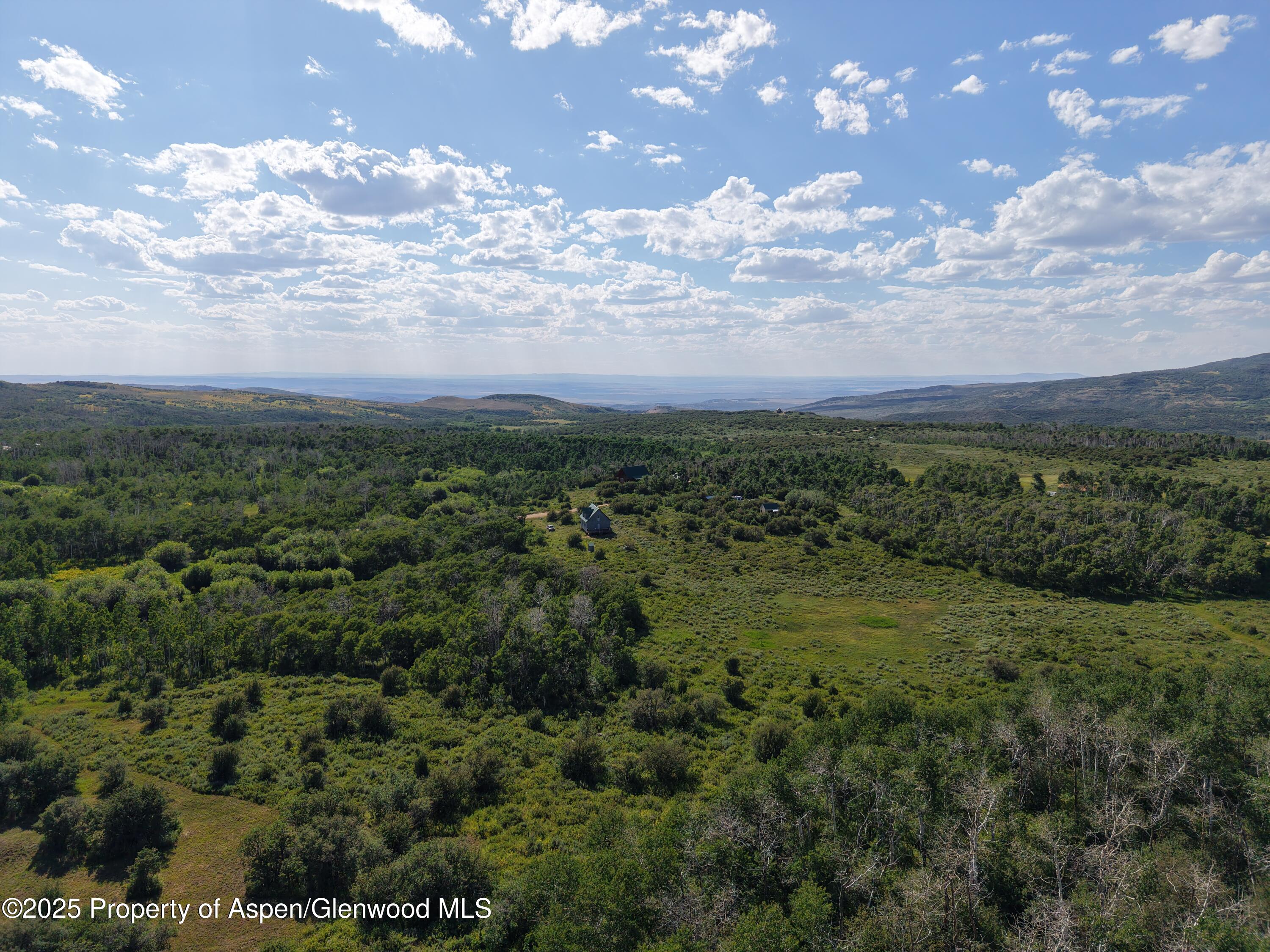 276 Sycamore Road, Unit LOT 288 Craig, CO 81625 - Photo 12 of 24 a view of a big yard with lots of green space