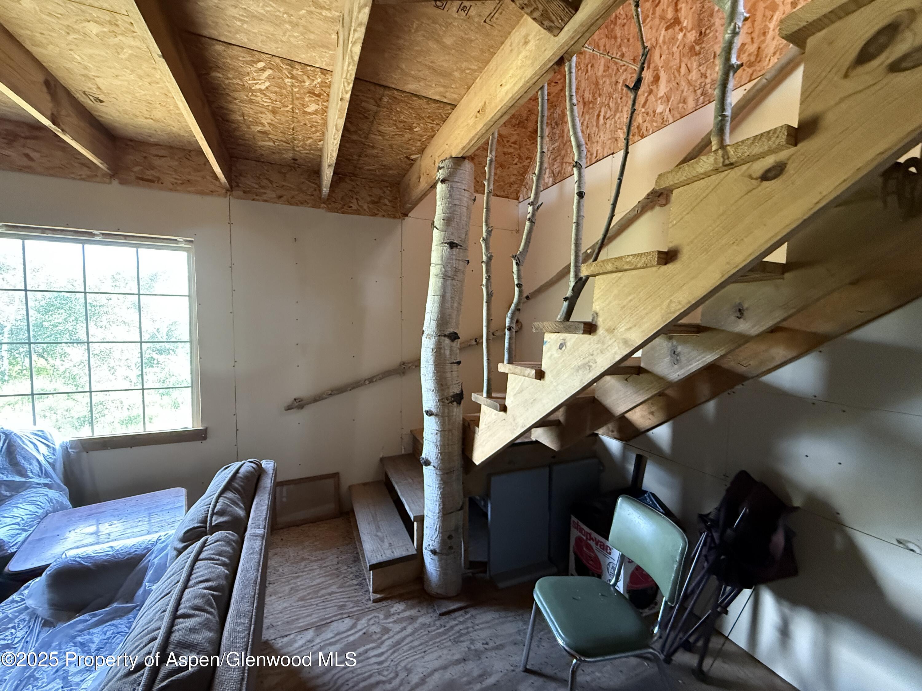 276 Sycamore Road, Unit LOT 288 Craig, CO 81625 - Photo 22 of 24 a view of entryway with furniture and wooden floor