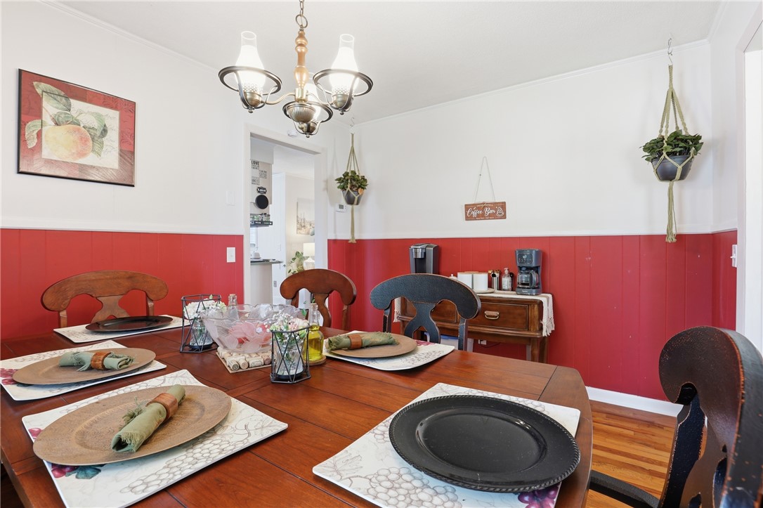 602 South Tugaloo Street Walhalla, SC 29691 - Photo 11 of 38 This inviting dining area features elegant hardwood flooring, perfect for memorable gatherings.