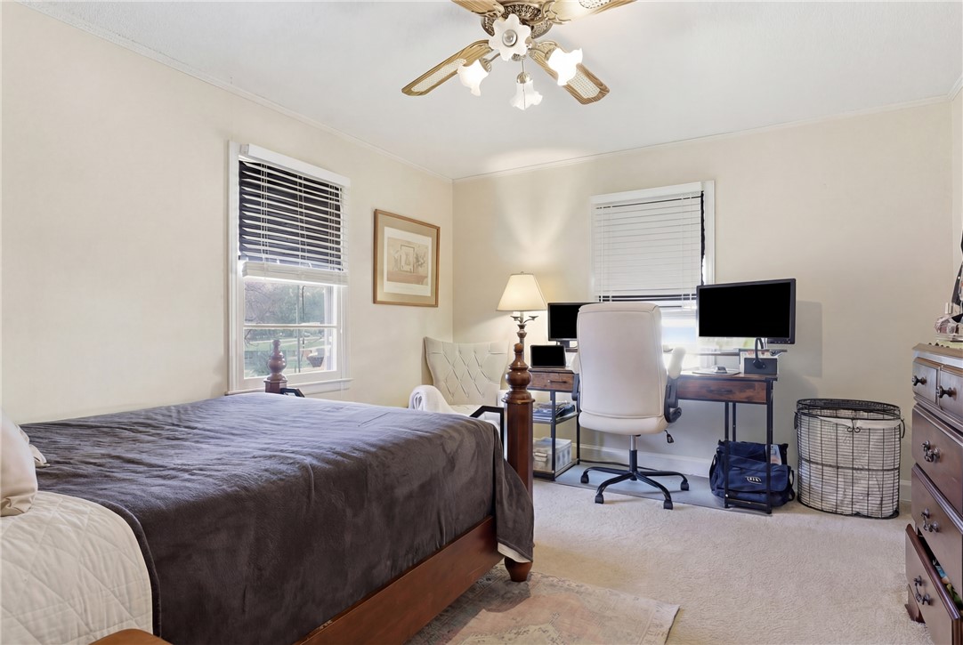 602 South Tugaloo Street Walhalla, SC 29691 - Photo 14 of 38 This spacious bedroom offers a bright and inviting atmosphere, perfect for rest and productivity.