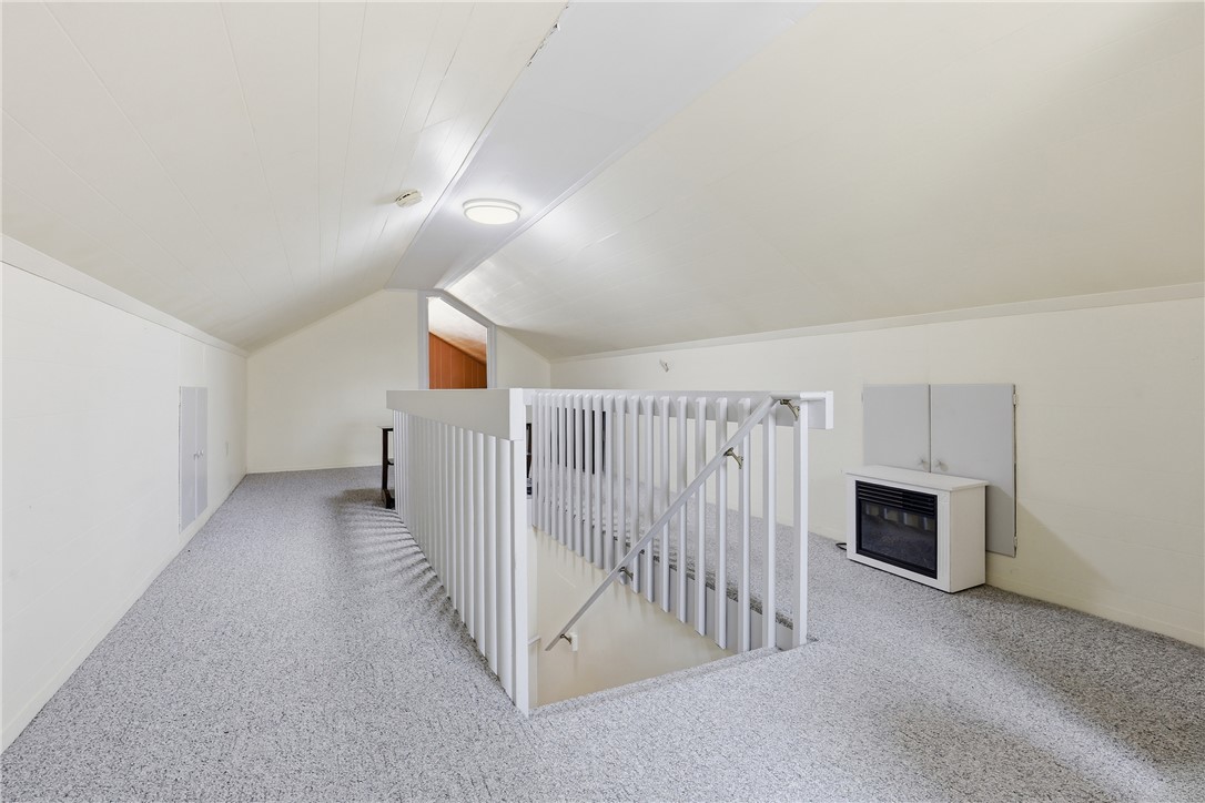 602 South Tugaloo Street Walhalla, SC 29691 - Photo 17 of 38 This versatile loft area features comfortable carpeting and a convenient staircase for easy access.