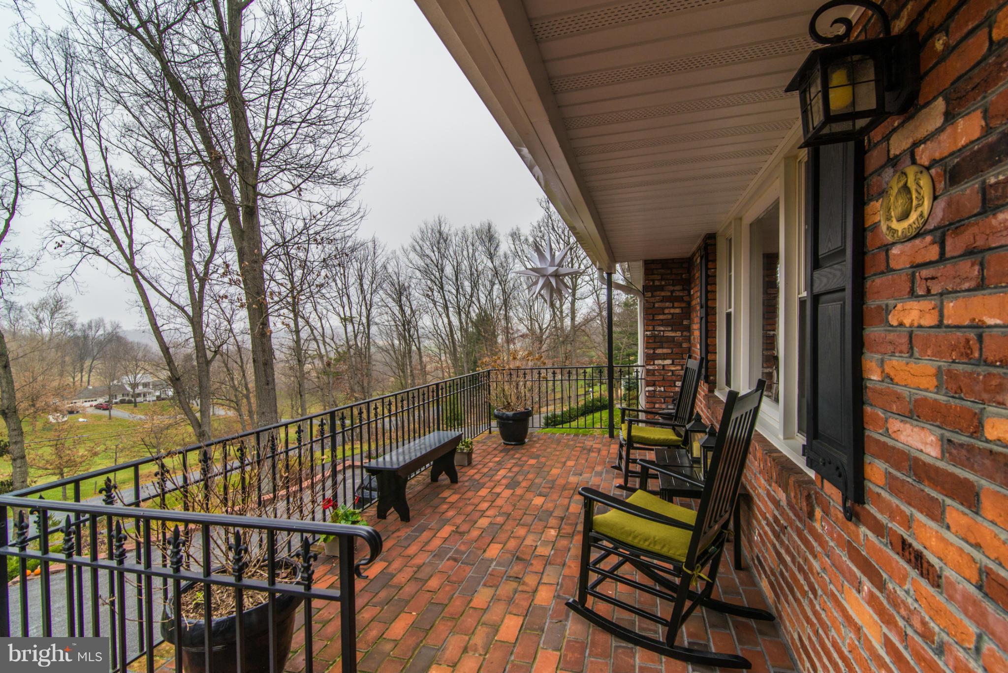 23901 Stringtown Road Clarksburg, MD 20871 - Photo 3 of 30 Brick Front Porch with Iron Railing