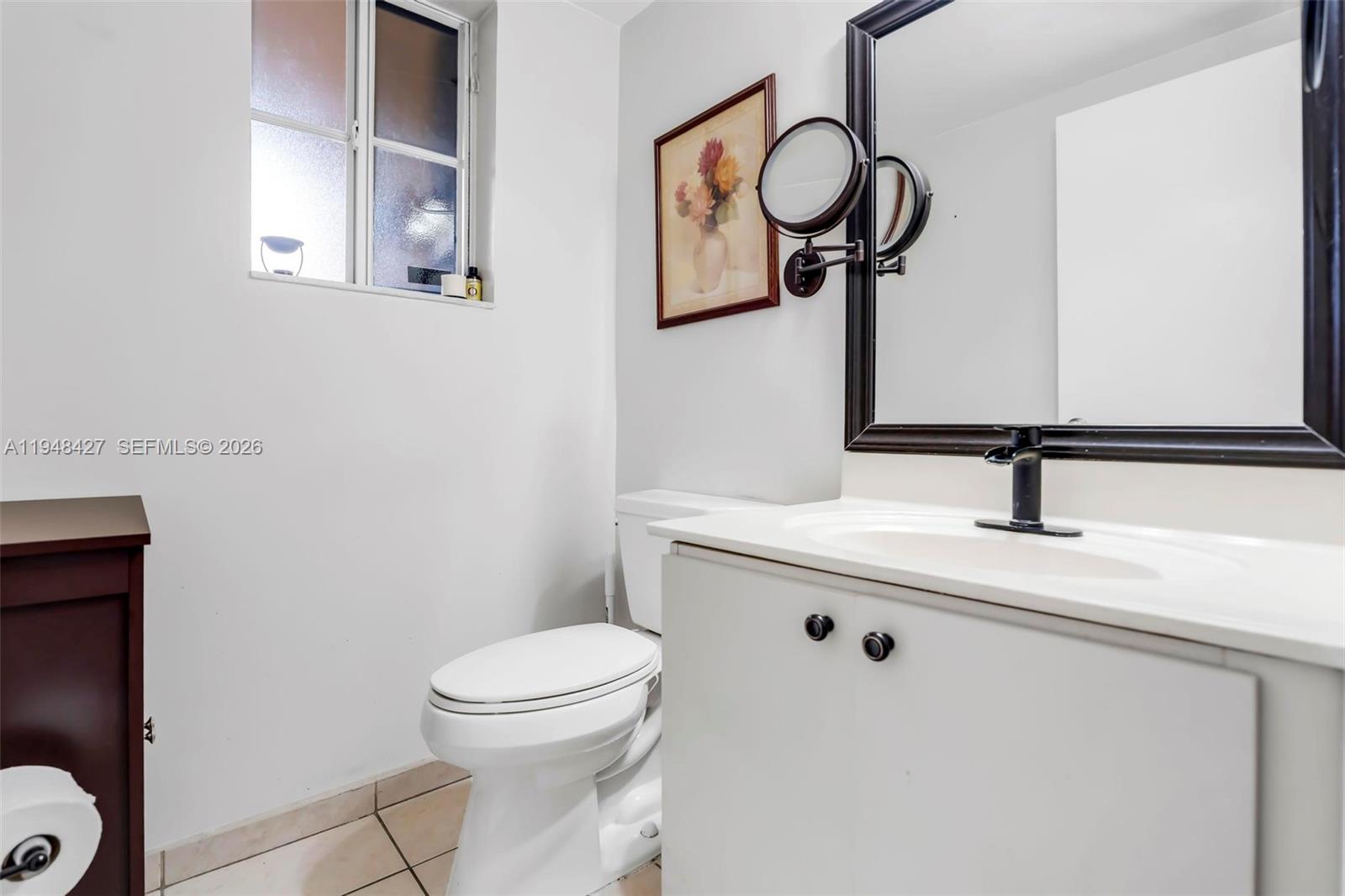 8735 Southwest 158th Path Miami, FL 33193 - Photo 18 of 50 Guest half bathroom downstairs