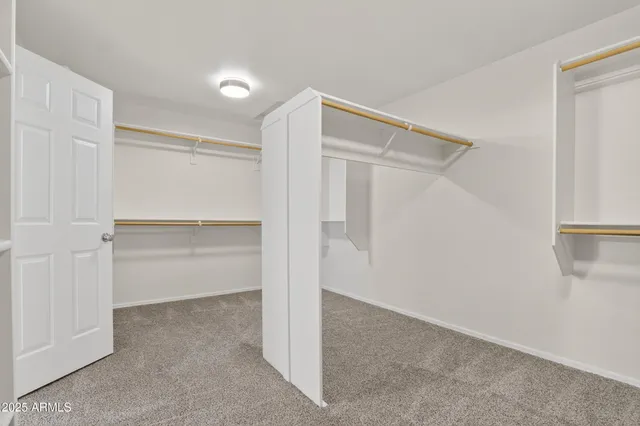a bathroom with a sink vanity and a mirror