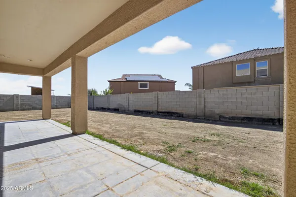 a view of a house with a patio