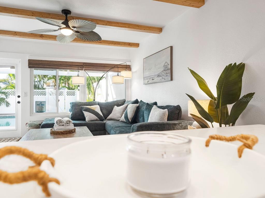 449 63rd Street Holmes Beach, FL 34217 - Photo 20 of 54 a living room with a couch