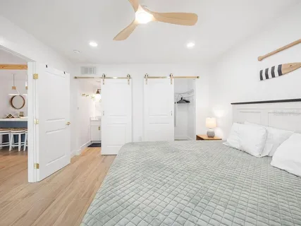 a view of a livingroom with wooden floor