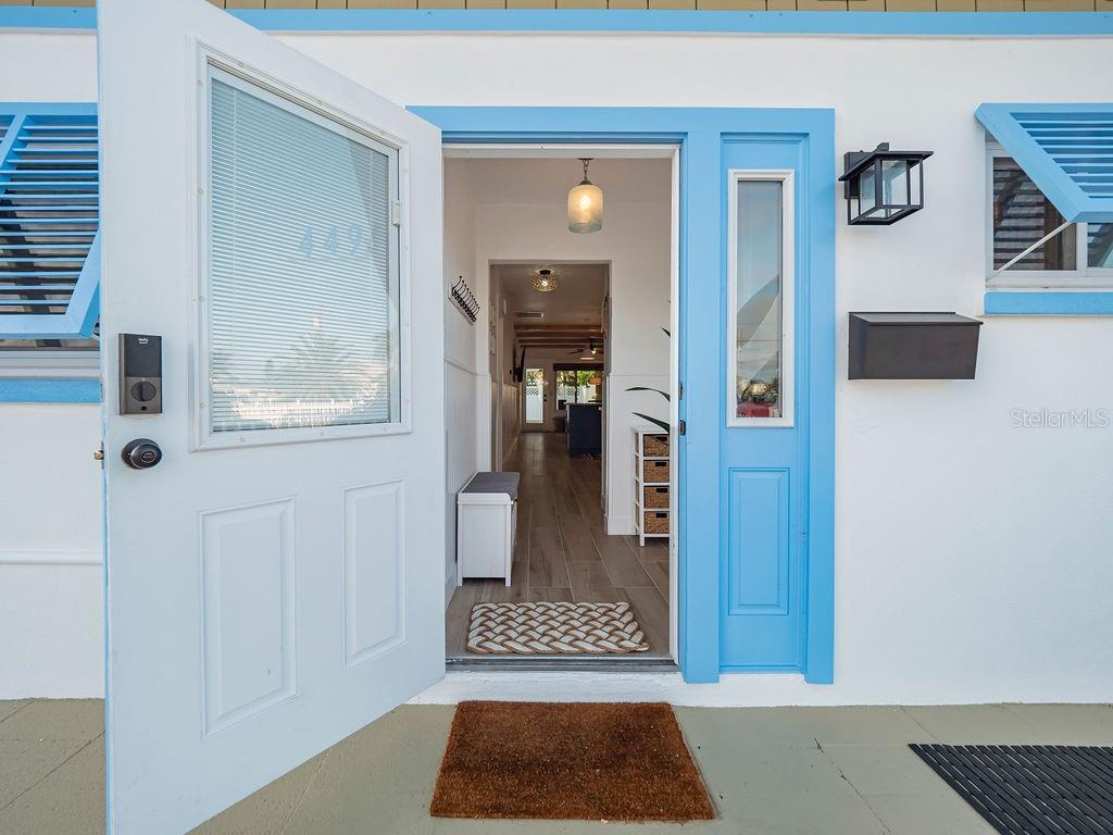 449 63rd Street Holmes Beach, FL 34217 - Photo 3 of 54 a view of front door