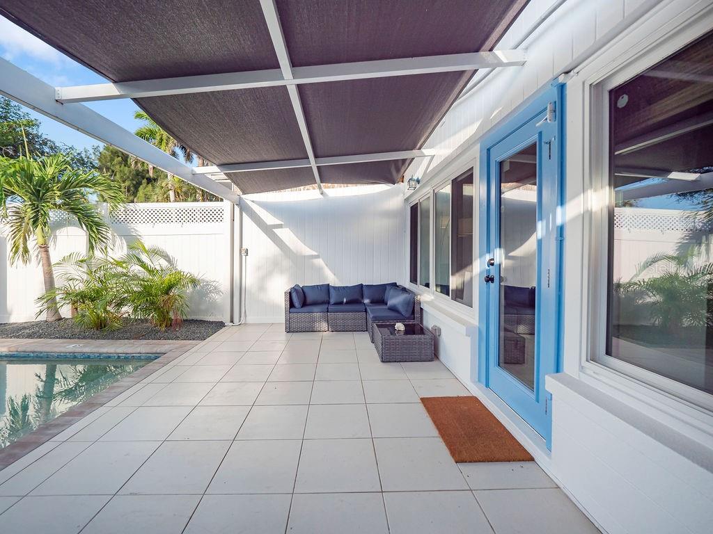 449 63rd Street Holmes Beach, FL 34217 - Photo 34 of 54 a view of a porch