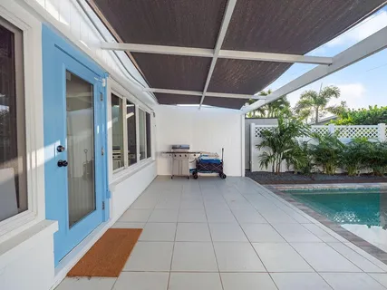 a view of outdoor space with deck and yard